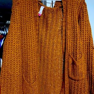 Rust orange colored sweaters